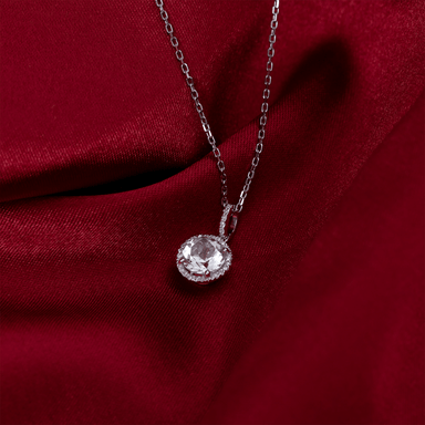 White Topaz and Diamond Halo Pendant